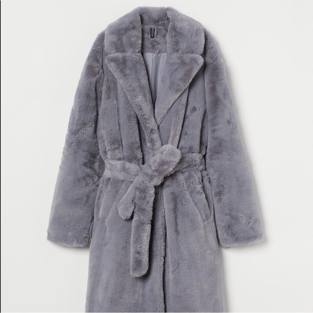 Faux fur coat size medium .